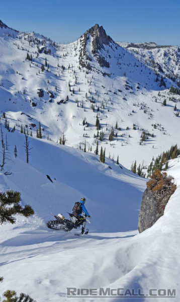 Dropping into a backcountry bowl on the Timbersled.
